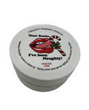 Kama Sutra Holiday Mini Massage Candle Dear Santa with playful lips and candy cane design.