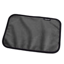 Liberator Fascinator Toy Pad Black placed on a flat surface to keep intimate items organized and clean.