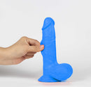 Get Lucky Real Skin Mr Navy 7.5 Inch Dual Layer Dildo in bold navy blue being held, showcasing its lifelike design.