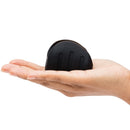 Fifty Shades Of Grey Sensation Vibrating Pleasure Stroker in a hand showcasing its compact design.