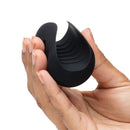 Fifty Shades Of Grey Sensation Vibrating Pleasure Stroker held in hand, showcasing its sleek design and silicone texture.