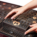 Lovehoney Luxury Advent Calendar 24 Day featuring numbered drawers and a hand opening drawer 24, enhancing anticipation.