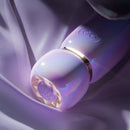 ZALO Lia Suction Massager Lavender Purple elegantly displayed on soft fabric, showcasing its advanced design and discreet features.