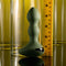 Evolved Lieutenant Vibrating Plug with egg-shaped base and textured shaft next to a ruler for size comparison