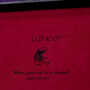 UPKO logo and quote on a pink surface, featuring playful imagery and a whimsical message about passion and turmoil.