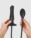 Strap On Me Inflatable Dildo Plug Black held in hands, showcasing the inflatable feature and sleek design.