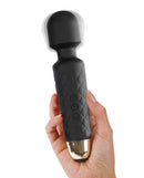 Dorcel Wanderful Wand Massager Black and Gold held in hand, showcasing its elegant design and powerful functionality.