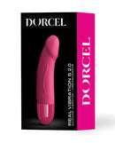 Dorcel Real Vibration S 6 Inch Rechargeable Vibrator Pink in its packaging, showcasing its sleek design and vibrant color.