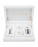 Le Wand Little Pleasures 6 Piece Vibrator Kit Chrome packaging with mini vibrators and accessories inside.