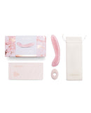 Le Wand Crystal G-Wand Stimulator Rose Quartz with packaging and accessories on display.