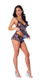Woman wearing Hazy Dayz Cami & Short Set with rainbow magic mushrooms that glow under blacklight, showcasing adjustable straps and purl edges.