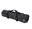 Edge Spiked Punishment Mat Black rolled up with straps, featuring durable pressure-point design and pyramid spikes.
