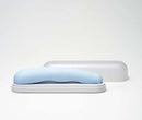 Tenga iroha TSUKI MINAMO silicone massager in blue with its storage case.