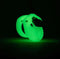 Mini-Me Glow-in-the-Dark Chastity Kit with 1.25-inch cage, illuminated green in dark setting for secure chastity play.