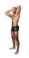 Man wearing HAZY DAYZ Pouch Short Pot Leaf with sheer mesh fabric and bright pot leaf print, showcasing a contoured and high-cut design.