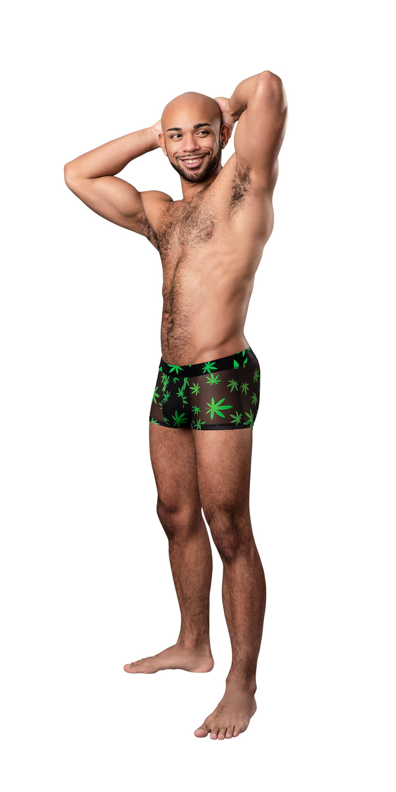 Man wearing HAZY DAYZ Pouch Short Pot Leaf with sheer mesh fabric and bright pot leaf print, showcasing a contoured and high-cut design.