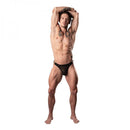 Model wearing Male Power Show Stopper Thong Black S/M showcasing its bold design and luxurious micro mesh.