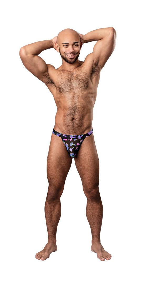 Man wearing Hazy Dayz Micro Thong in Mushroom S/M, showcasing superior styling, comfort, and enhanced body contours.