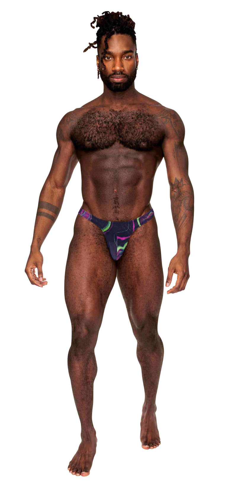 Model showcasing Galactic Print Bong Thong S/M by Male Power Lingerie, featuring colorful cosmic design and low-rise waist.