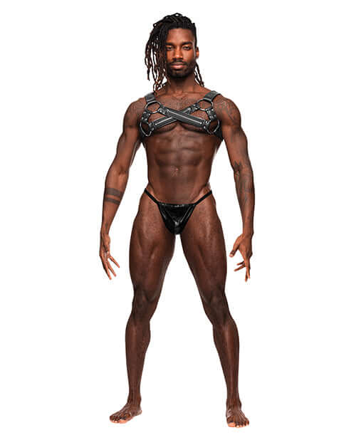 Model wearing the Virgo Leather Harness Black O/S from Male Power Lingerie, showcasing a stylish criss-cross design.