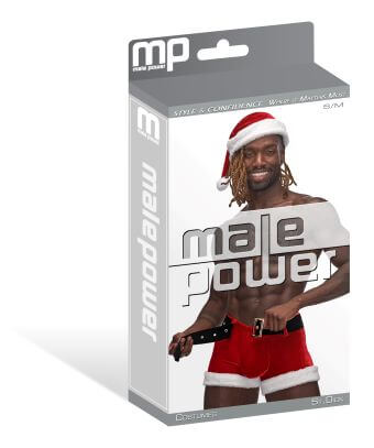 Male Power St. Dick Shorts Red S/M packaging with model wearing Santa hat and plush-trimmed shorts. Christmas costume collection.