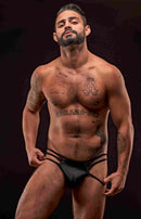 Male Power Cage Briefs Black S M modeled by a muscular man showcasing bold strappy design and confidence-boosting style.