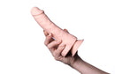 Kyle 8 inches Realistic Silicone Dong Brown held in hand, showcasing its lifelike appearance and detailed design.