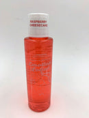Emotion Lotion Raspberry Cheesecake Warming Lotion 4 Fl Oz bottle with raspberry cheesecake label and warm formula