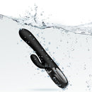 Viben Hypnotic Clit Teaser and Thrusting Rabbit Black submerged in water with droplets creating a splash.
