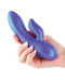 Hand holding Seduction Angel Metallic Purple Body-Safe Rechargeable Vibrator by NS Novelties