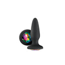 Glams Black Butt Plug Rainbow featuring a smooth silicone design and a colorful gem base for decorative appeal.