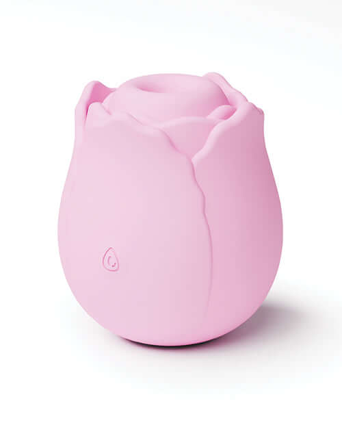 Rechargeable pink rose-shaped clitoral stimulator made of body-safe silicone, waterproof and ergonomically designed.