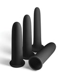 Renegade Vibrating Dilators Set Black consisting of four black plush stackable sleeves for sexual wellness.