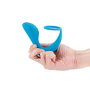 Renegade Slingshot II Cock Ring & Prostate Plug Teal held in hand, showcasing its innovative design for prostate pleasure.