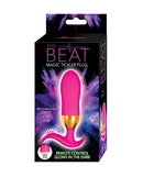Nasstoys The Beat Magic Tickler Vibrating Plug Pink packaging showcasing remote control and glow-in-the-dark features.