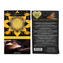 Kama Sutra Honey Dust Coconut Pineapple Body Powder 1 Oz packaging with sensual feather applicator.