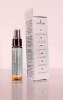 Deeply Love You Throat Spray Chocolate Mint 1 Oz bottle and box packaging on a reflective surface.