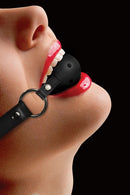 Close-up of person wearing Ouch Gag Ball Black, showcasing its sleek design and comfortable fit during playful restraint.