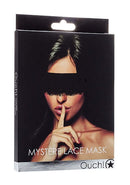 Ouch Mystere Lace Mask Black packaging featuring a mysterious model holding a finger to her lips.
