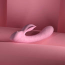 Playboy Rabbit Party Silicone Rabbit Vibrator Purple on a soft pink background.