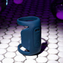Playboy Jet Pack Double-Ring Penis Vibrator for Enhanced Pleasure in dark blue on a vibrant tile surface