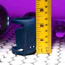 Playboy Jet Pack Double-Ring Penis Vibrator by ruler showcasing size against purple background.