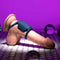 Playboy Jet Pack Double-Ring Penis Vibrator for Enhanced Pleasure on display with purple lighting backdrop.