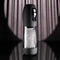 Playboy Whirlwind Stroker with Turbo Mode, a thrusting and spinning masturbator showcasing its sleek design against a dramatic backdrop.