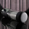 Playboy Whirlwind Stroker with clear spiral design and control buttons for customizable thrusting and spinning stimulation.
