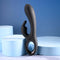 Playboy Late Night Bunny rechargeable dual vibrator in black, showcased on blue display foam.