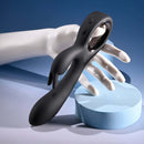 Playboy Late Night Bunny rechargeable silicone dual vibrator in black on a mannequin hand.