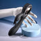 Playboy Late Night Bunny rechargeable silicone dual vibrator in black on a mannequin hand.