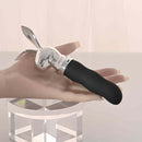 Playboy Bunny on the Go Rabbit Head Mini Vibrator Black displayed on a hand with a sleek design and powerful features.