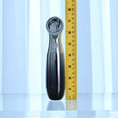 Playboy Bon Voyage Rechargeable Silicone Vibrator alongside a measuring tape for size reference.